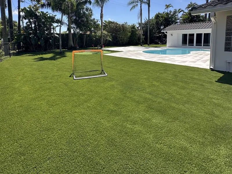 After: Pet turf play lawn and putting green installed by Creative Grounds