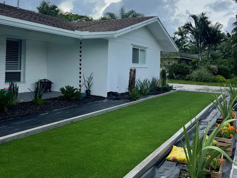 Bocce court turf with clean borders and landscape beds