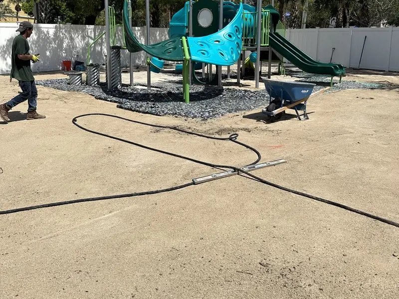 Playground base preparation before artificial turf in Bonita Springs