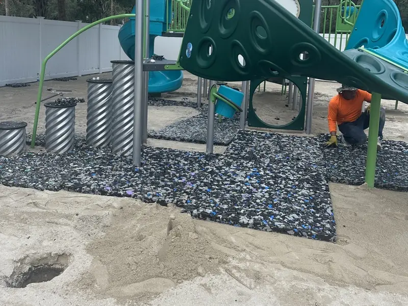 Playground impact pads installed under turf in Bonita Springs FL