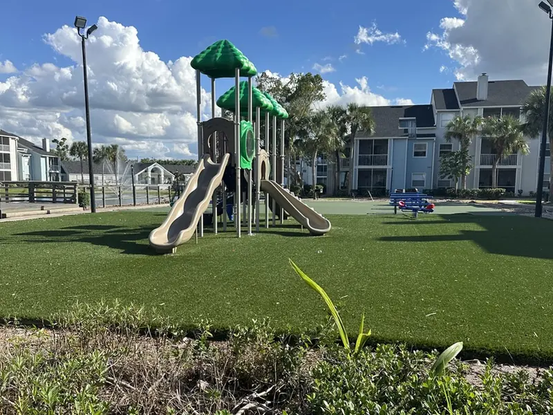 Apartment community playground turf in Fort Myers FL