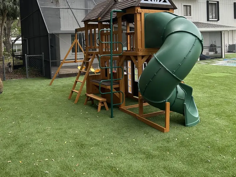Backyard playset on artificial turf in Fort Myers FL
