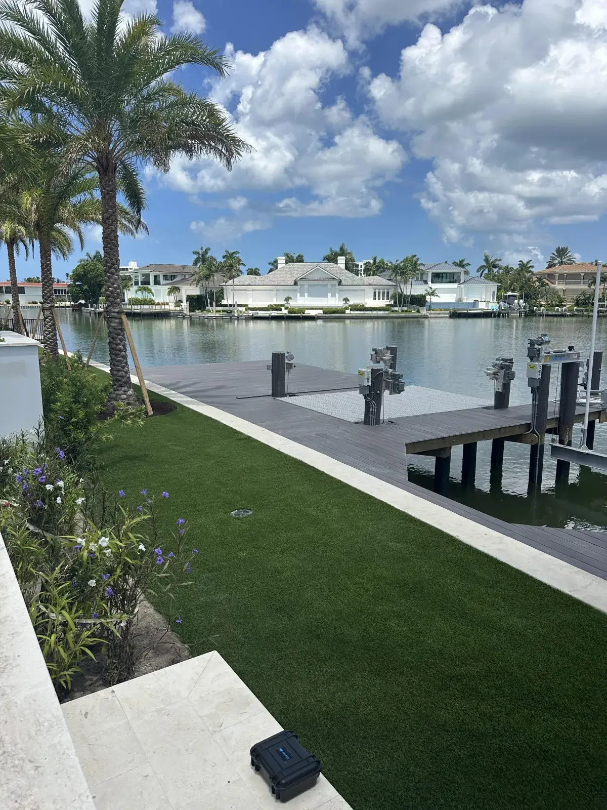 Waterfront artificial grass lawn with dock in The Moorings, Naples