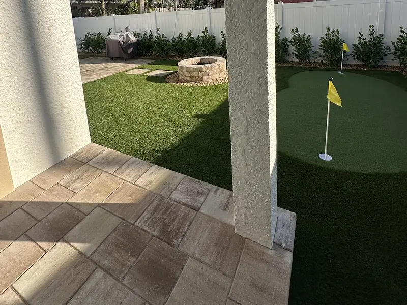 Putting green from the lanai by Creative Grounds at the Pink House in Bonita Springs FL